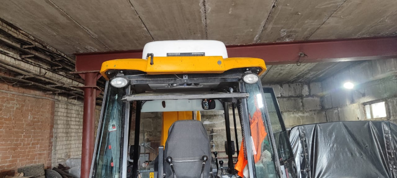 Установка стояночного кондиционера на экскаватор-погрузчик